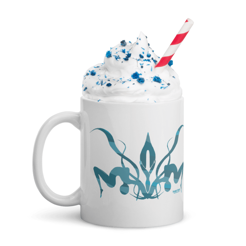 White mug with teal Punany flower art topped with whipped cream and a straw